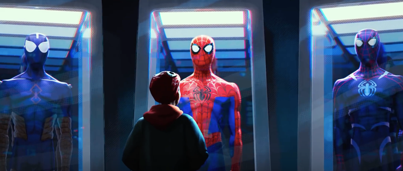 Miles looking at various incarnations of the Spider-Man suits Peter has in storage.